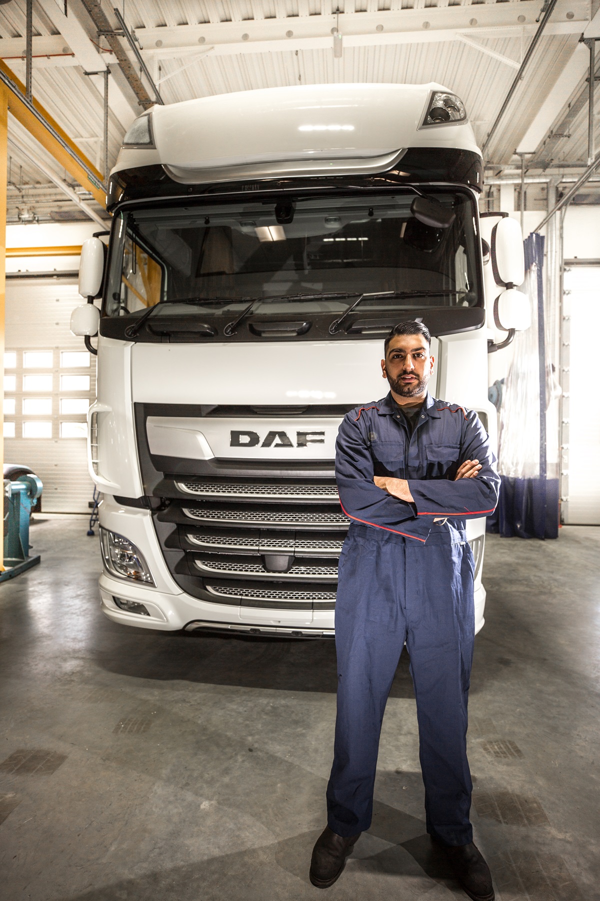 DAF technician working in workshop dealership